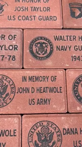 Engraved memorial bricks honoring service members